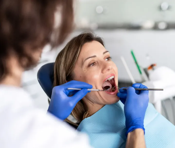 Woman relaxed in the dental chair during an exam