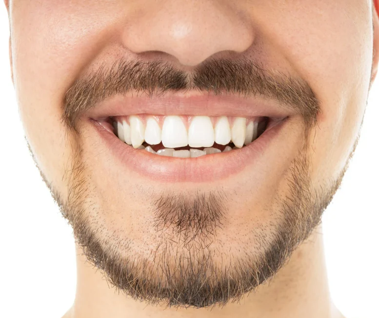 Close-up of a man's healthy smile